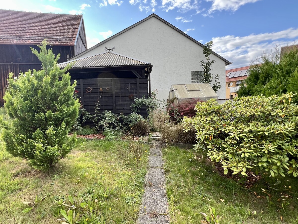 Gartenlaube und Gewächshaus